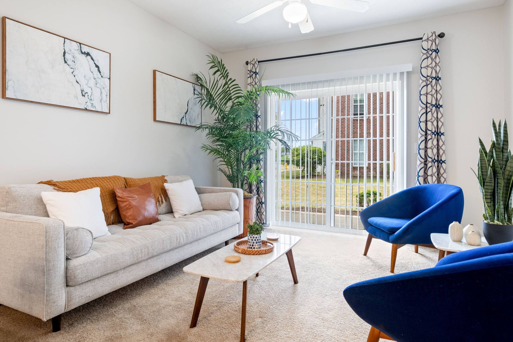 Luxury apartment kitchen with stainless steel appliances, granite countertops, and lots of storage space